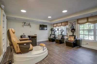 Interior of a beauty salon with massage chairs