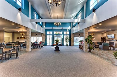Bright and spacious common area with seating and windows