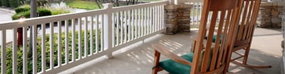 Rocking chairs on a porch at the facility