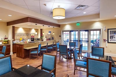 Interior dining area with tables and chairs