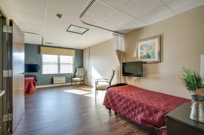 Interior view of a resident room with furniture