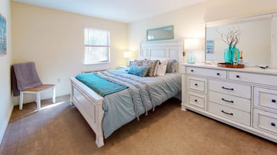 Cozy private resident room with neutral decor