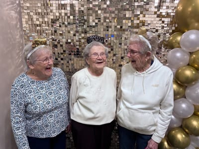Residents celebrating together in a festive setting