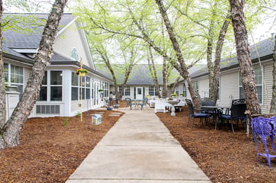 Outdoor courtyard area with seating and trees