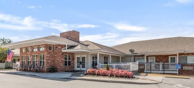 Exterior view of Autumn View Gardens facility with landscaping