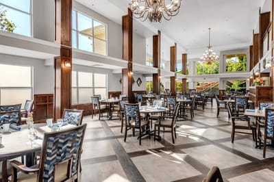 Bright dining room with tables and chairs