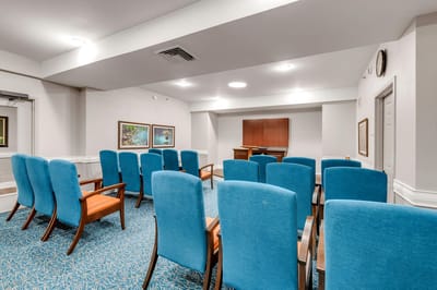 Interior of a common area with blue chairs