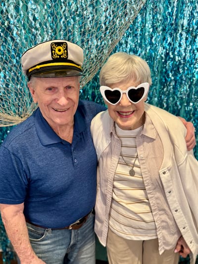 Residents enjoying a themed event together, smiling