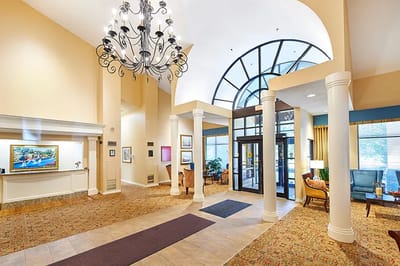 Bright lobby with seating areas and decor