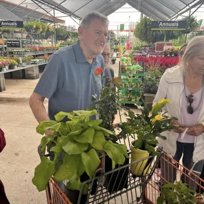 Residents participating in a plant shopping activity