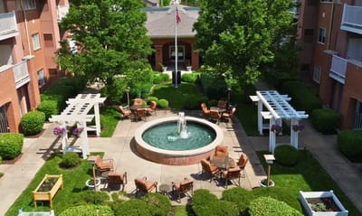 Aerial view of a serene outdoor space with a fountain