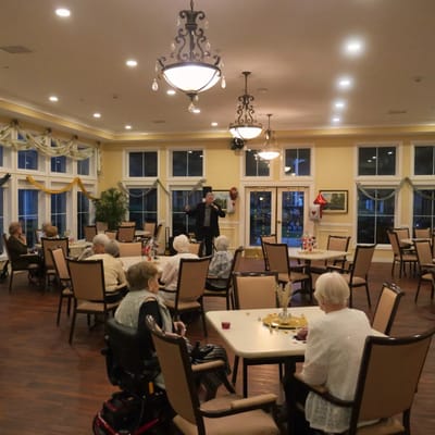 Residents enjoying an event in a common area