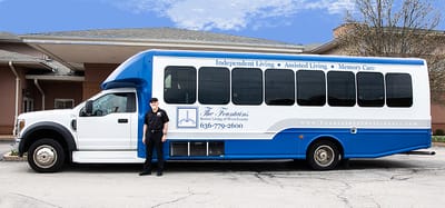 Facility transport van with staff member