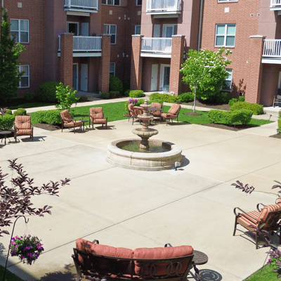 Beautiful courtyard with fountain and lounge chairs