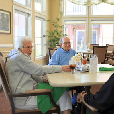 Residents enjoying a meal in the dining area