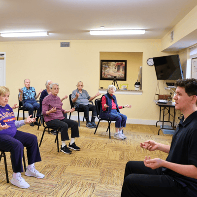 Residents participating in a guided activity session