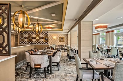 Elegant dining room with stylish decor and lighting