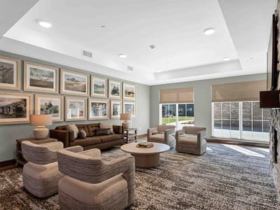 Bright and inviting common area with seating and artwork