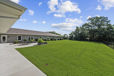 Spacious outdoor lawn area with well-maintained grass