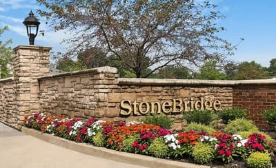 Exterior view of StoneBridge facility entrance with flowers