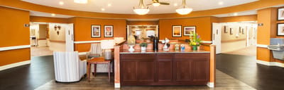 Bright common area with seating and artwork