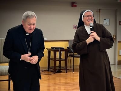 Two residents engaged in a lively conversation