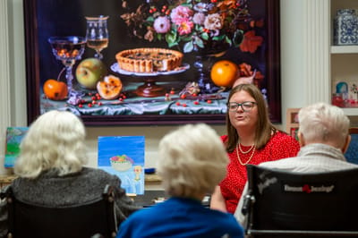 Residents engaged in an art activity session