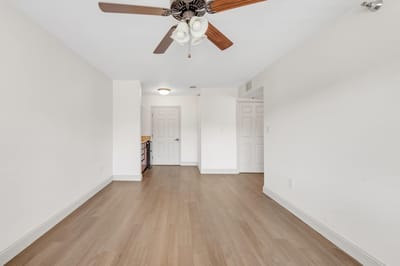 Interior view of a resident room with wooden floors