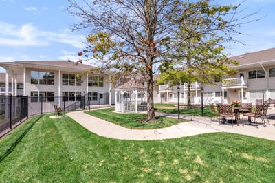 Outdoor area with gazebo and landscaping.