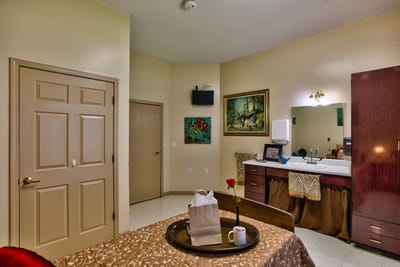 Cozy interior of a resident room with a meal tray