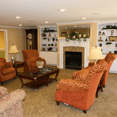 Cozy common area with seating and a fireplace