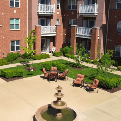 Outdoor courtyard with seating and fountain