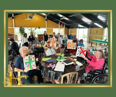 Residents engaged in a creative group activity