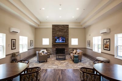 Common area with seating and a television