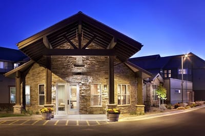 Modern facility building entrance at dusk