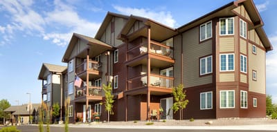 Exterior view of assisted living facility with balconies