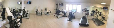 Interior of an exercise room with fitness equipment