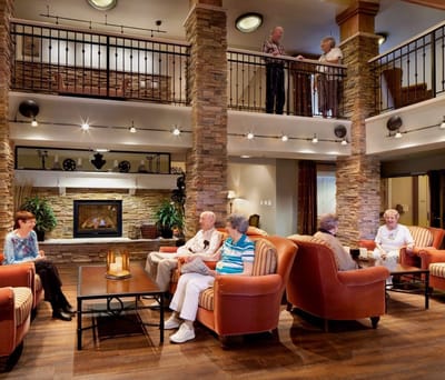 Residents socializing in a cozy lounge area