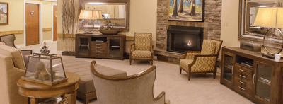 Cozy common area with seating and fireplace