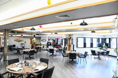 Bright dining area with decorated tables and chairs