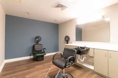 Interior view of a salon area with styling chairs