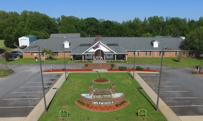 Aerial view of Caremoor Retirement Center building and entrance