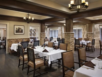 Dining area with elegant table settings and decor