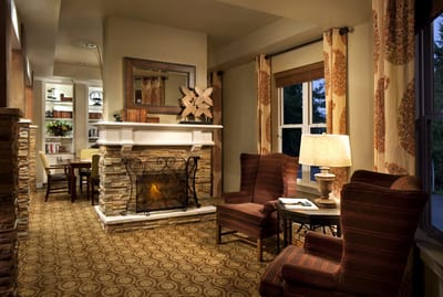 Cozy common area with a fireplace and seating