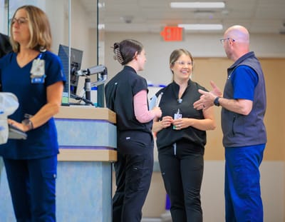 Staff interacting in a facility's common area