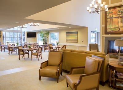 Bright common area with seating and artwork