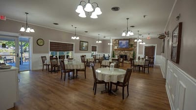 Bright dining room with tables and chairs