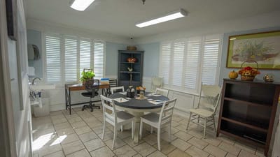 Bright interior room with a table and chairs