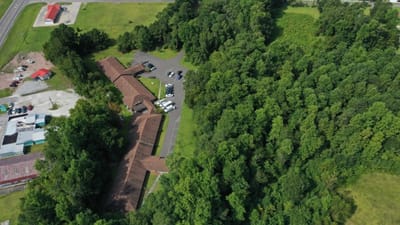 Aerial view of Tabor Commons surrounded by trees