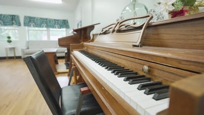 Close-up of a piano in a common area